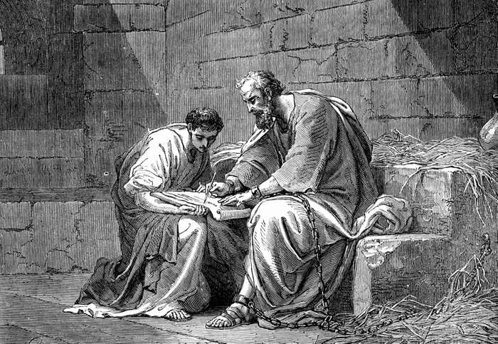 Paul the Apostle in prison, writing his epistle to the Ephesians